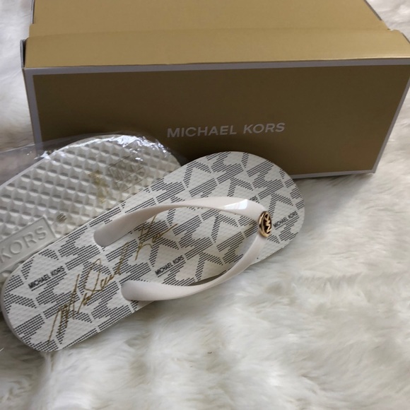 Michael Kors Shoes - Michael Kors Jet set vanilla flip flops size 8 NIB